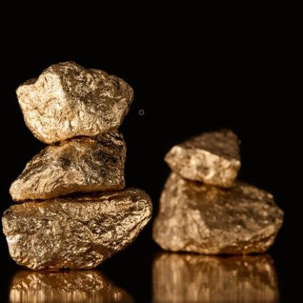 https://tradecogrup.com/wp-content/uploads/2019/08/selective-focus-of-three-stacks-of-gold-shiny-stone-410x410-1-424x425.jpg